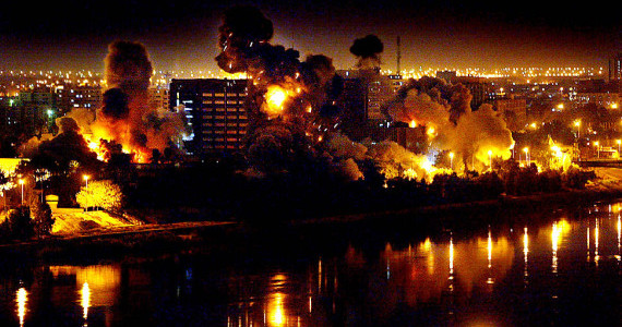 On the second night of war against Iraq, bombs fall on government buildings located in the heart of Baghdad along the Tigris River.  Multiple bombs left several buildings in flames and others completely destroyed.